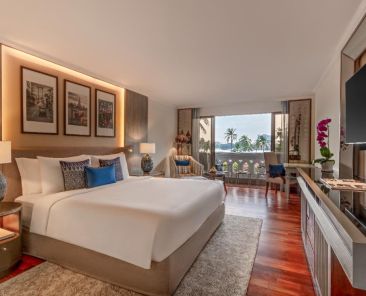 Luxury boutique hotel room interior design with natural textures and ambient lighting
