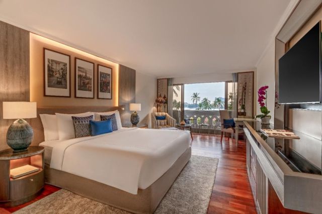 Luxury boutique hotel room interior design with natural textures and ambient lighting